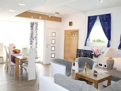 Ein Sitzbereich in der Unterkunft Vulkaneifel Comfortable holiday residence