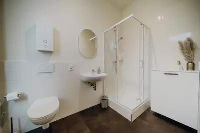 Ein Badezimmer in der Unterkunft LLR Design Apartment - Soleil Blanc im Zentrum von Koblenz