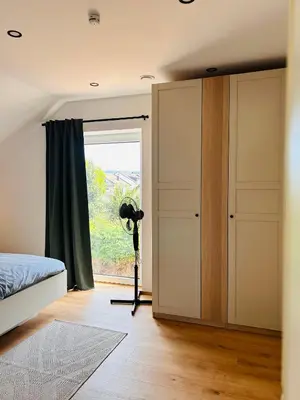 Ein Bett oder Betten in einem Zimmer der Unterkunft FeWo zur Römischen Weinstraße