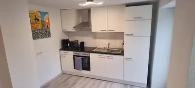 Küche/Küchenzeile in der Unterkunft Ferienwohnung Trier-Euren