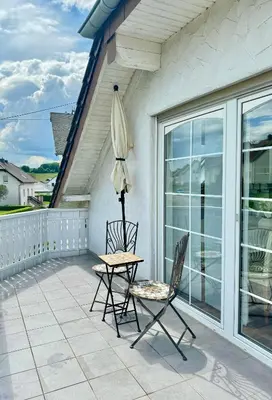 Ein Balkon oder eine Terrasse in der Unterkunft Ferienwohnung Seensucht Bostalsee