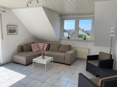Ein Sitzbereich in der Unterkunft Ferienwohnung Maifeldblick Polch