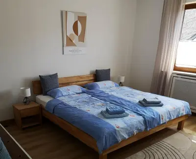 Ein Bett oder Betten in einem Zimmer der Unterkunft Ferienwohnung Marx