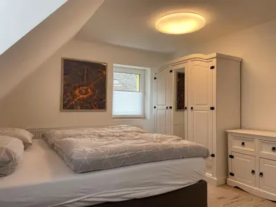 Ein Bett oder Betten in einem Zimmer der Unterkunft Auszeit
