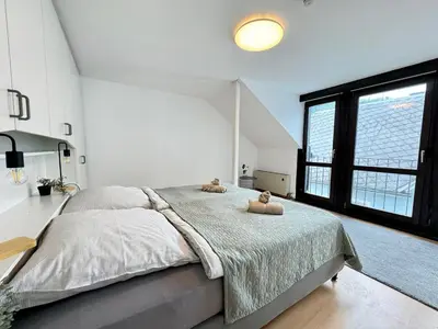 Ein Bett oder Betten in einem Zimmer der Unterkunft Erholung pur am Rhein