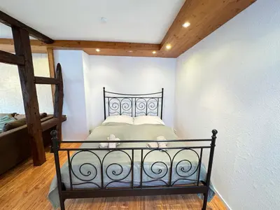 Ein Bett oder Betten in einem Zimmer der Unterkunft Großes Apartment an der Loreley