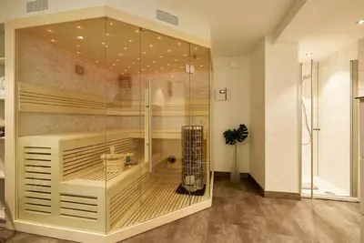 Ein Badezimmer in der Unterkunft Ferienhaus mit Whirlpool und Sauna