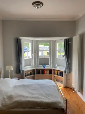Ein Bett oder Betten in einem Zimmer der Unterkunft Ferienwohnung Moselsteig