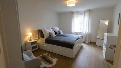 Ein Bett oder Betten in einem Zimmer der Unterkunft Mosel Appartment One - MIS