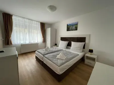 Ein Bett oder Betten in einem Zimmer der Unterkunft Hotel Briedeler Haus