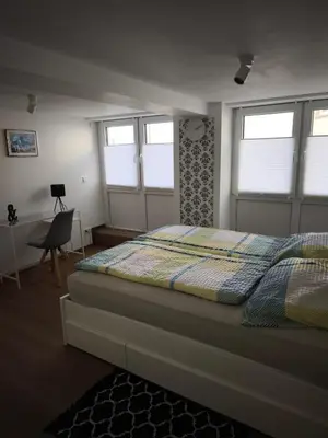 Ein Bett oder Betten in einem Zimmer der Unterkunft Wohnung in Mülheim-Kärlich