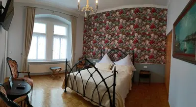 Ein Bett oder Betten in einem Zimmer der Unterkunft Ferienhaus Historischer Winzerverein Boutique B&B