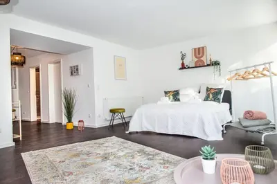 Ein Bett oder Betten in einem Zimmer der Unterkunft Bendorfer Stadl mit Whirlpool & Sauna