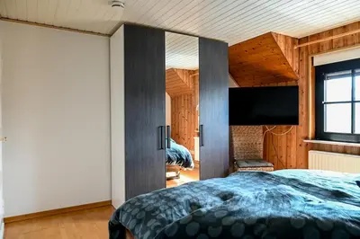 Ein Bett oder Betten in einem Zimmer der Unterkunft Ferienwohnung Boxenstopp
