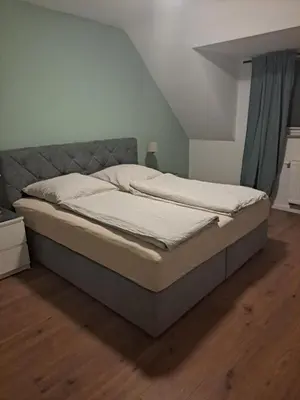 Ein Bett oder Betten in einem Zimmer der Unterkunft ZigZag Apartments
