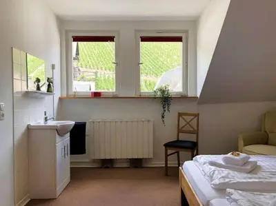 Ein Bett oder Betten in einem Zimmer der Unterkunft Ferienhaus Schwanennest
