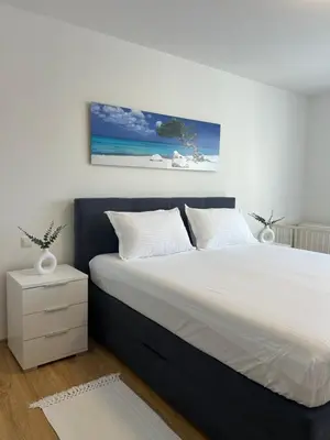 Ein Bett oder Betten in einem Zimmer der Unterkunft Ferienwohnung in Gerolstein Zentrum