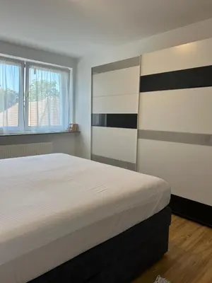 Ein Bett oder Betten in einem Zimmer der Unterkunft Ferienwohnung in Gerolstein Zentrum