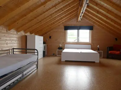 Ein Bett oder Betten in einem Zimmer der Unterkunft Holiday home family Junk
