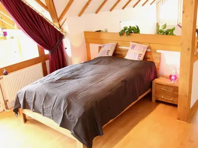 Ein Bett oder Betten in einem Zimmer der Unterkunft Winkelchen Comfortable holiday residence