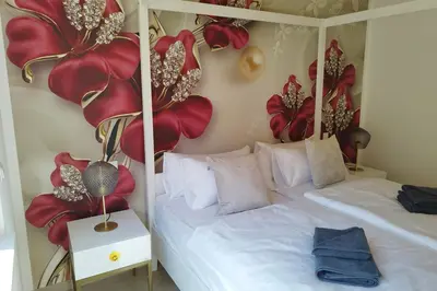 Ein Bett oder Betten in einem Zimmer der Unterkunft Apprimus Ferienwohnungen - Waldsee Rieden Panoramaterrasse 4 EG