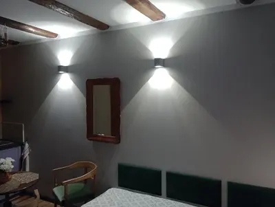 Ein Bett oder Betten in einem Zimmer der Unterkunft Alte Brennerei Apartments