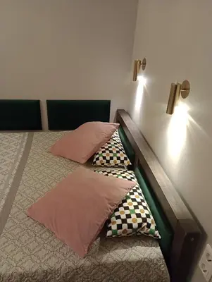 Ein Bett oder Betten in einem Zimmer der Unterkunft Alte Brennerei Apartments