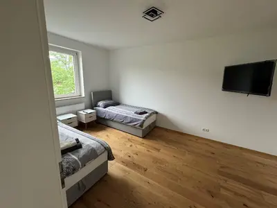 Ein Bett oder Betten in einem Zimmer der Unterkunft Rheinmosel Glück City