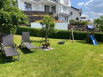 Ein Garten an der Unterkunft Schwalbennest