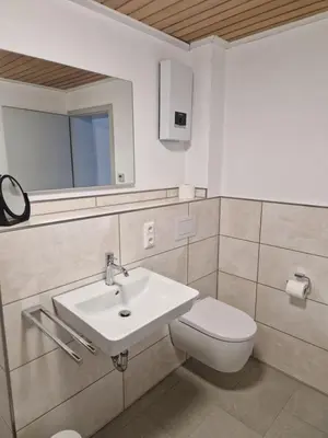 Ein Badezimmer in der Unterkunft Gästehaus 