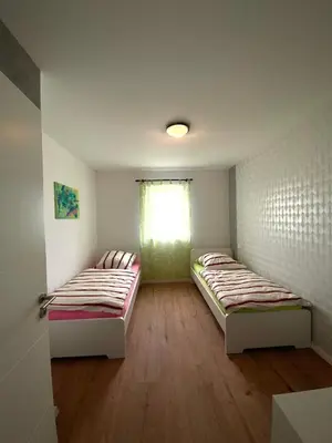 Ein Bett oder Betten in einem Zimmer der Unterkunft Naturnahe Wohnung in Zettingen A