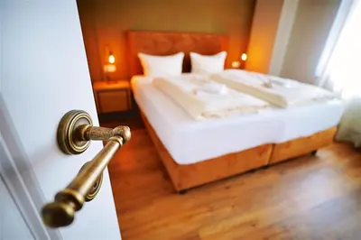 Ein Bett oder Betten in einem Zimmer der Unterkunft Winzerhaus am Kardinalsberg