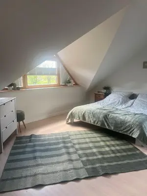 Ein Bett oder Betten in einem Zimmer der Unterkunft Chez Ellie- Ferienwohnung Nähe Nürburgring, Rhein, Ahr, Eifel