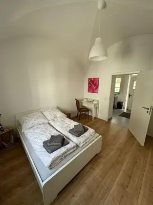 Ein Bett oder Betten in einem Zimmer der Unterkunft Appartment in Winningen
