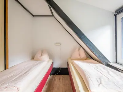 Ein Bett oder Betten in einem Zimmer der Unterkunft Holiday Home Haus 30 by Interhome