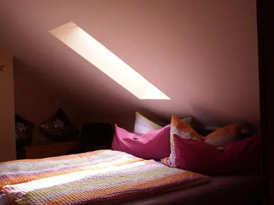 Ein Bett oder Betten in einem Zimmer der Unterkunft Ferienwohnung Georg