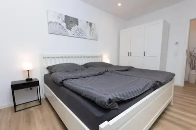 Ein Bett oder Betten in einem Zimmer der Unterkunft Kichinger Hof 37