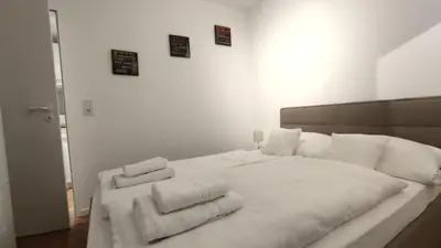 Ein Bett oder Betten in einem Zimmer der Unterkunft Ferienwohnung - alle Kosten inklusive! Bettwäsche, Handtücher, Internet