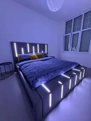 Ein Bett oder Betten in einem Zimmer der Unterkunft Luxuswohnung im Stadtzentrum
