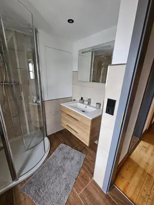 Ein Badezimmer in der Unterkunft Hofis Gästehaus