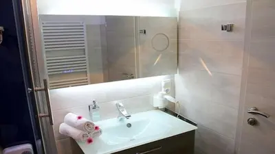 Ein Badezimmer in der Unterkunft Ferienwohnung Apartment Seeterrasse - im Maarberg Resort - in Schalkenmehren am See