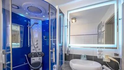 Ein Badezimmer in der Unterkunft Ferienwohnung Maaridyll - im Maarberg Resort - in Schalkenmehren am See