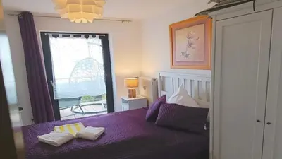 Ein Bett oder Betten in einem Zimmer der Unterkunft Ferienwohnung Seeblick II