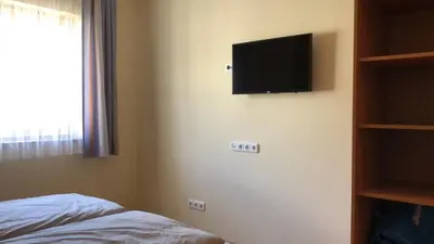 TV/Unterhaltungsangebot in der Unterkunft Rheinliebe Bistro und Pension