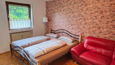 Ein Bett oder Betten in einem Zimmer der Unterkunft Föhren Apartment