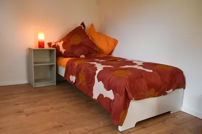 Ein Bett oder Betten in einem Zimmer der Unterkunft Wohnung mit Wohlfühlcharakter