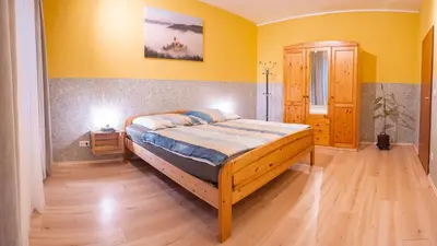 Ein Bett oder Betten in einem Zimmer der Unterkunft Fewo Thielke Fewo 2 Weinkeller