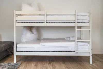 Ein Bett oder Betten in einem Zimmer der Unterkunft EifelComfort Traumhafte Ferienwohnung für 6 Personen in zentraler Lage!