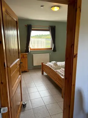 Ein Bett oder Betten in einem Zimmer der Unterkunft Ferienwohnung Burg Katz