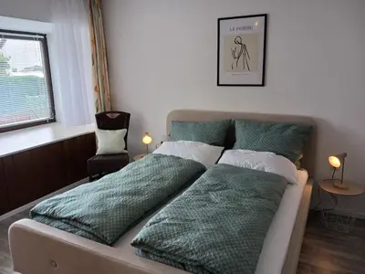 Ein Bett oder Betten in einem Zimmer der Unterkunft Ferienwohnung Susanna
